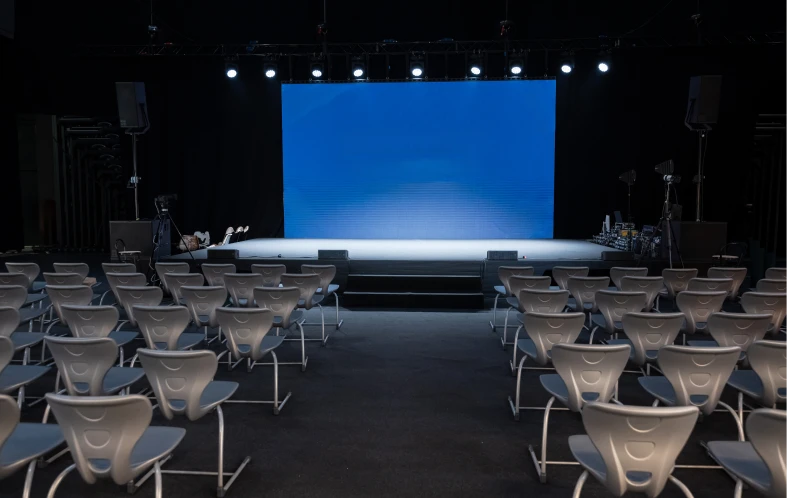 Stage setup with blue backdrop