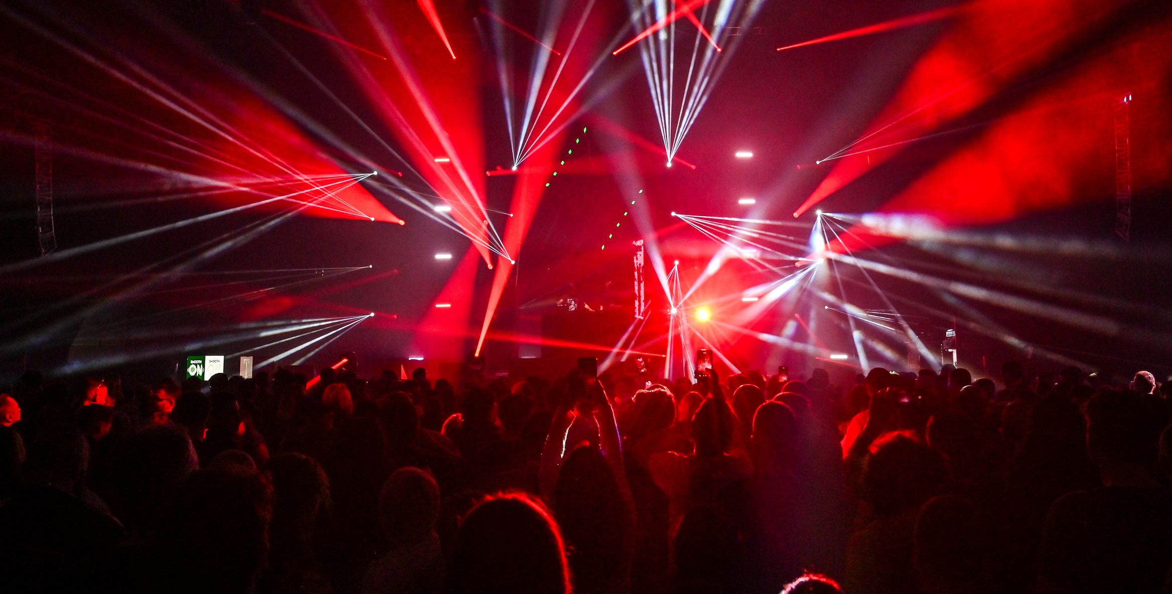 Partygoers enjoying red light show