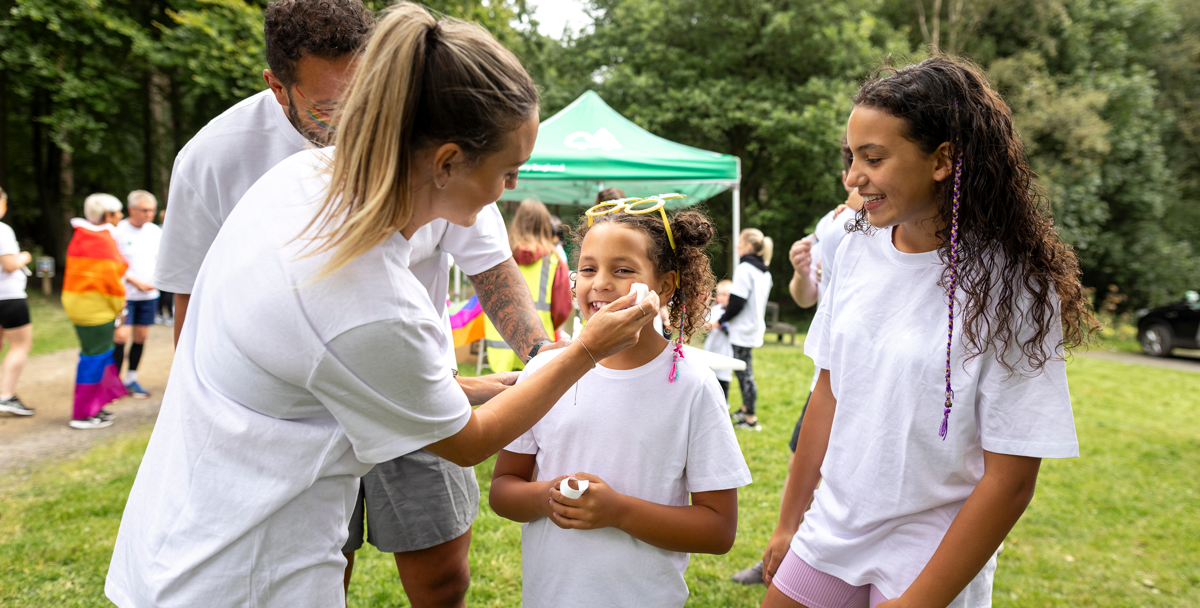 Children laughing at park gathering
