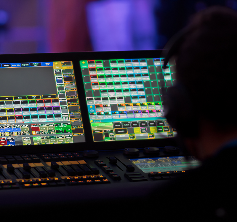 Audio engineer at digital mixing console